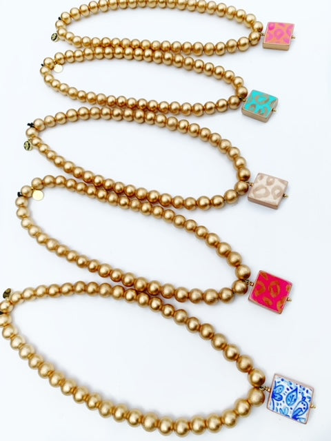 Gold Beaded Necklace -Blue and White Pendant - Stretchy