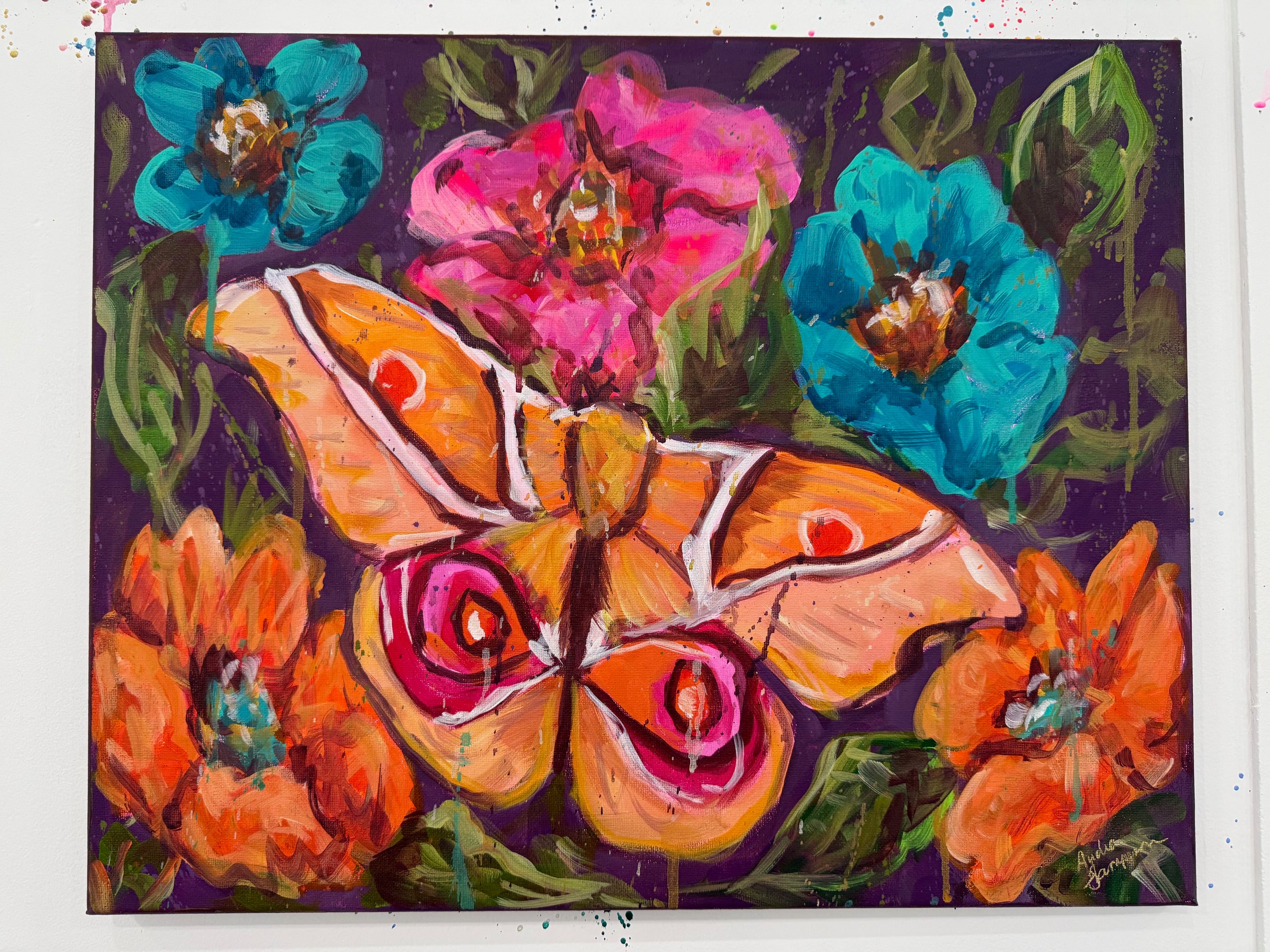 Original acrylic painting titled Porch Light Gospel featuring a large peach and amber silk moth with magenta eye spots, surrounded by coral poppies, hot pink blooms, and teal flowers against a deep eggplant purple background. 16x20 inches on gallery-wrapped canvas.